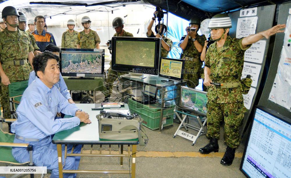 Abe briefed on SDF operations in mudslide-hit Hiroshima
