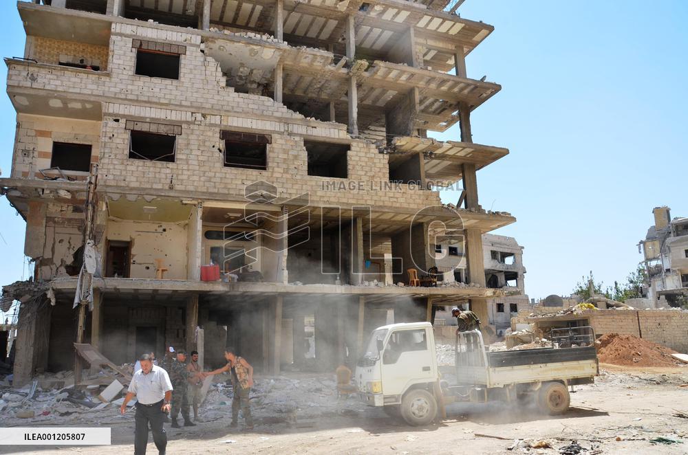 Building in ruins after battle in Syria