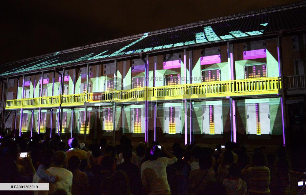 3D images of Tomioka Silk Mill projected on warehouse wall