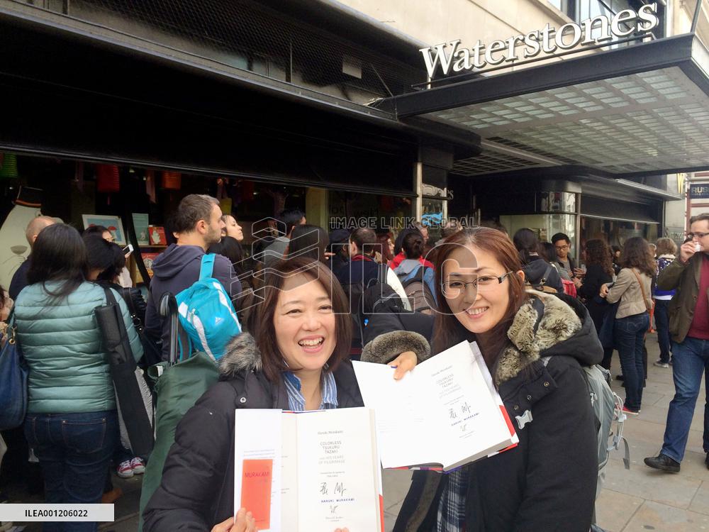 Women show off Haruki Murakami's autograph in London