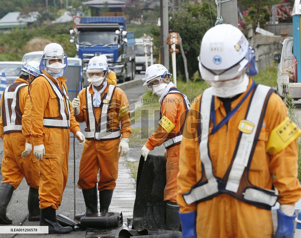 Cleanup work continues in village hit by nuke disaster
