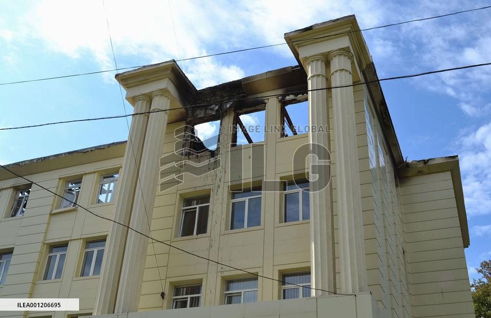 School in eastern Ukraine's Donetsk damaged by rocket