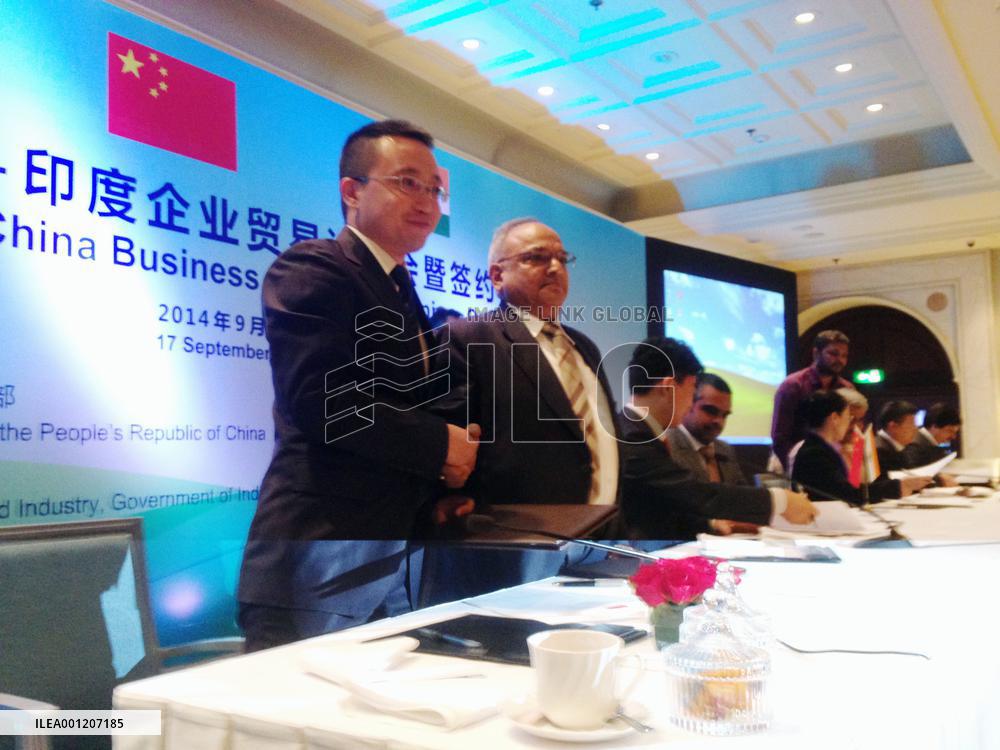 Chinese, Indian firms strike business deal in New Delhi