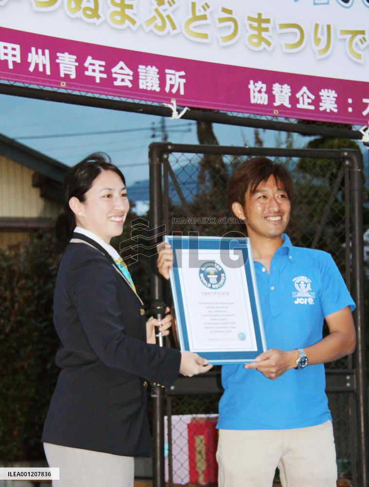 Guinness record set for biggest grape-spitting contest