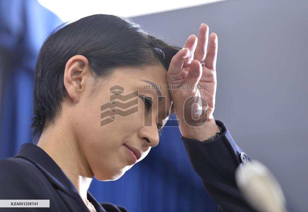 Industry minister Obuchi resigns from post