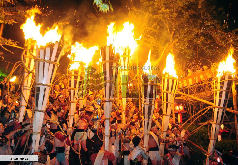 Huge torches light up night sky at Kyoto fire festival
