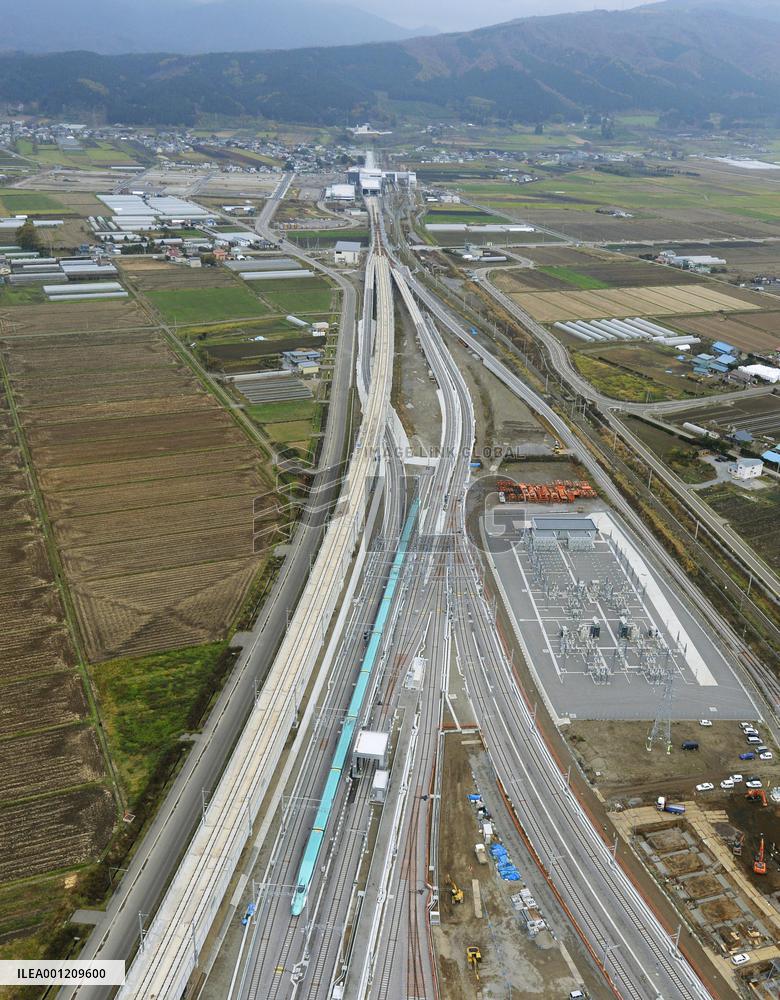 Japan's north, south tips linked by bullet train system