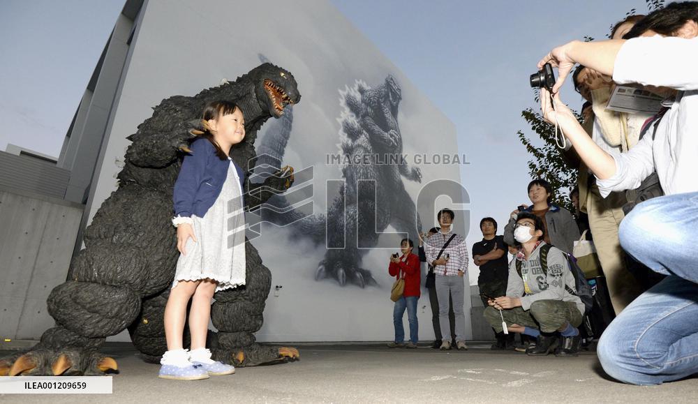 Commemorative photo taken with 'Godzilla'