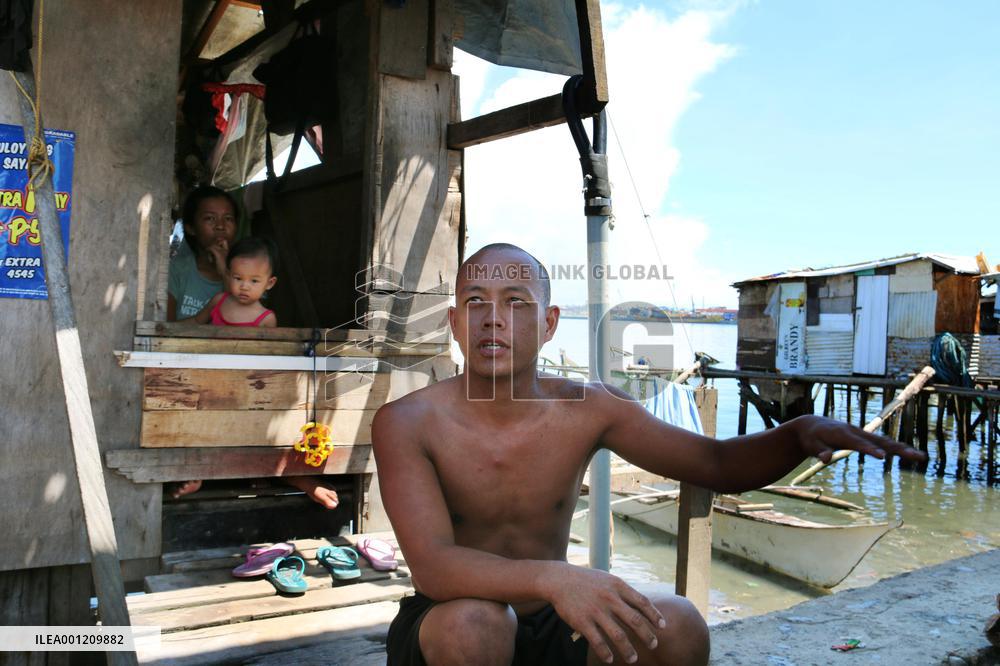 Fishmerman opts to live in typhoon-hit city