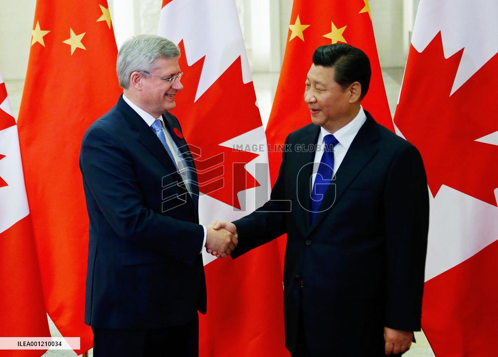 Canada PM Harper, China Pres. Xi hold talks in Beijing