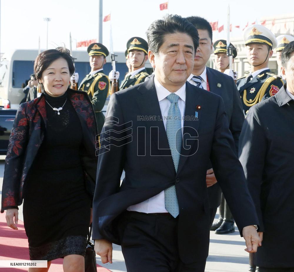 Abe leaves for Myanmar from China
