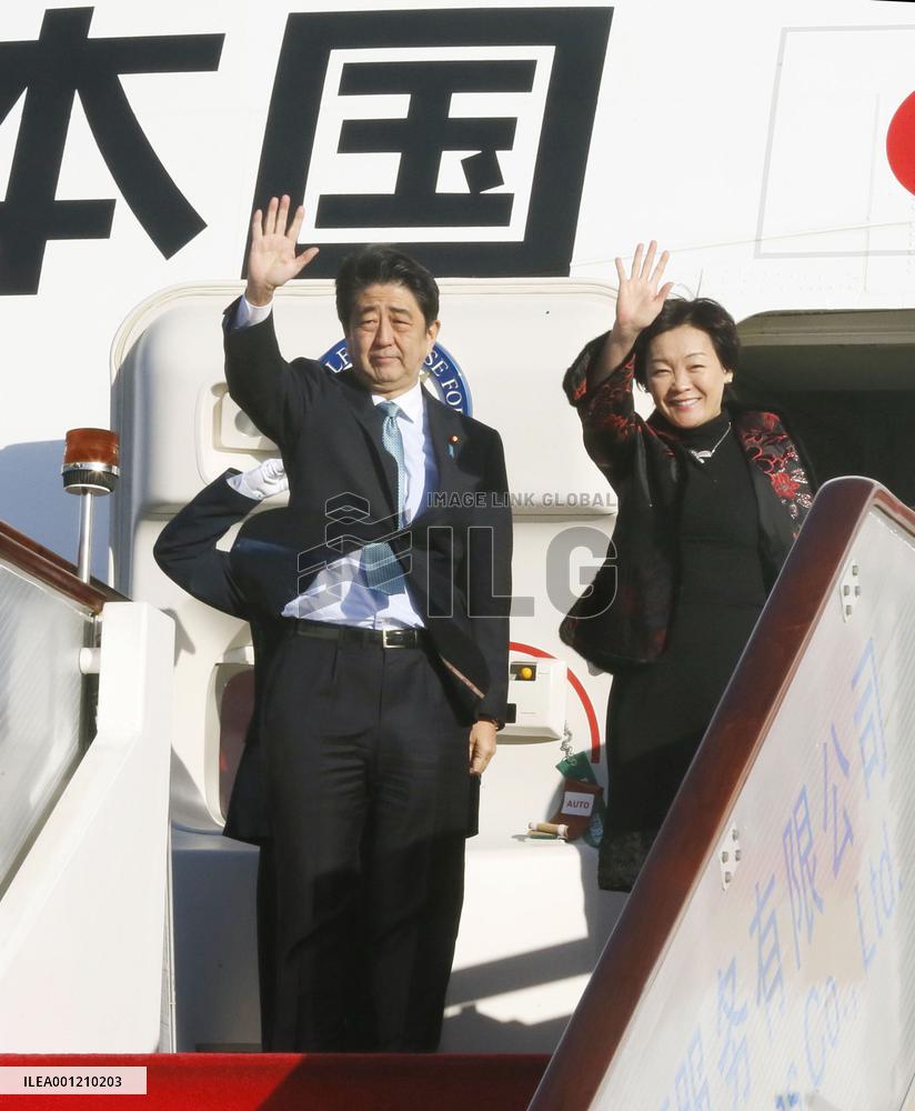 Abe leaves for Myanmar from China
