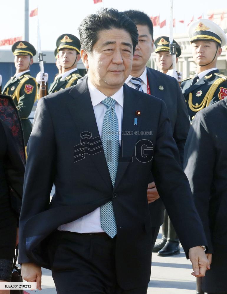 Abe leaves for Myanmar from China