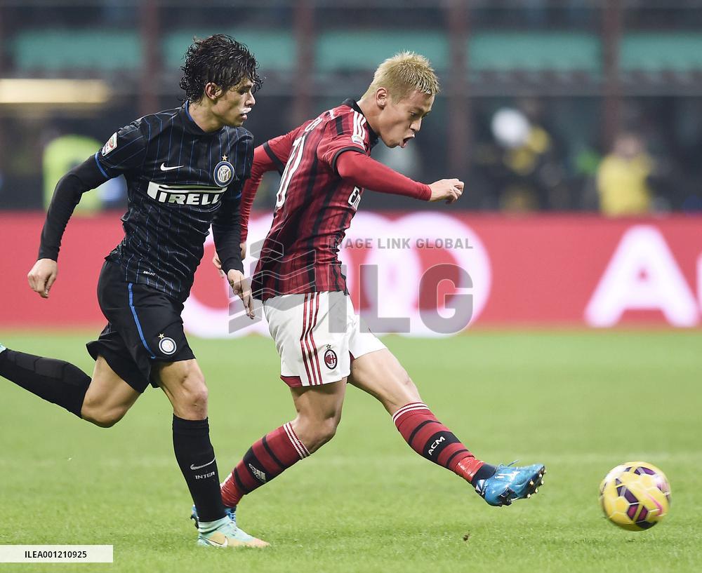 AC Milan's Honda in action in Milan derby