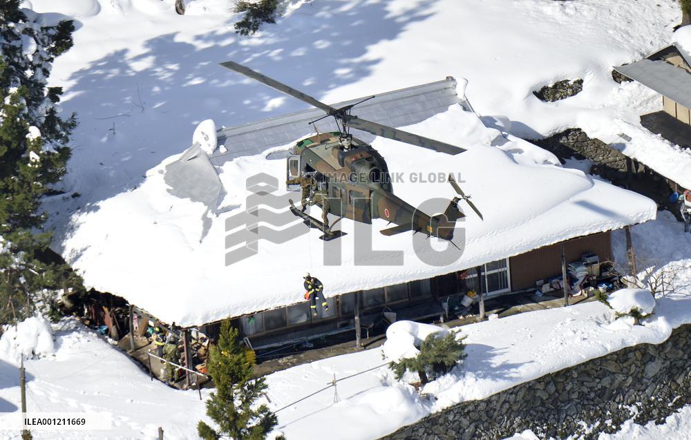 Wide areas of Japan hit by heavy snow
