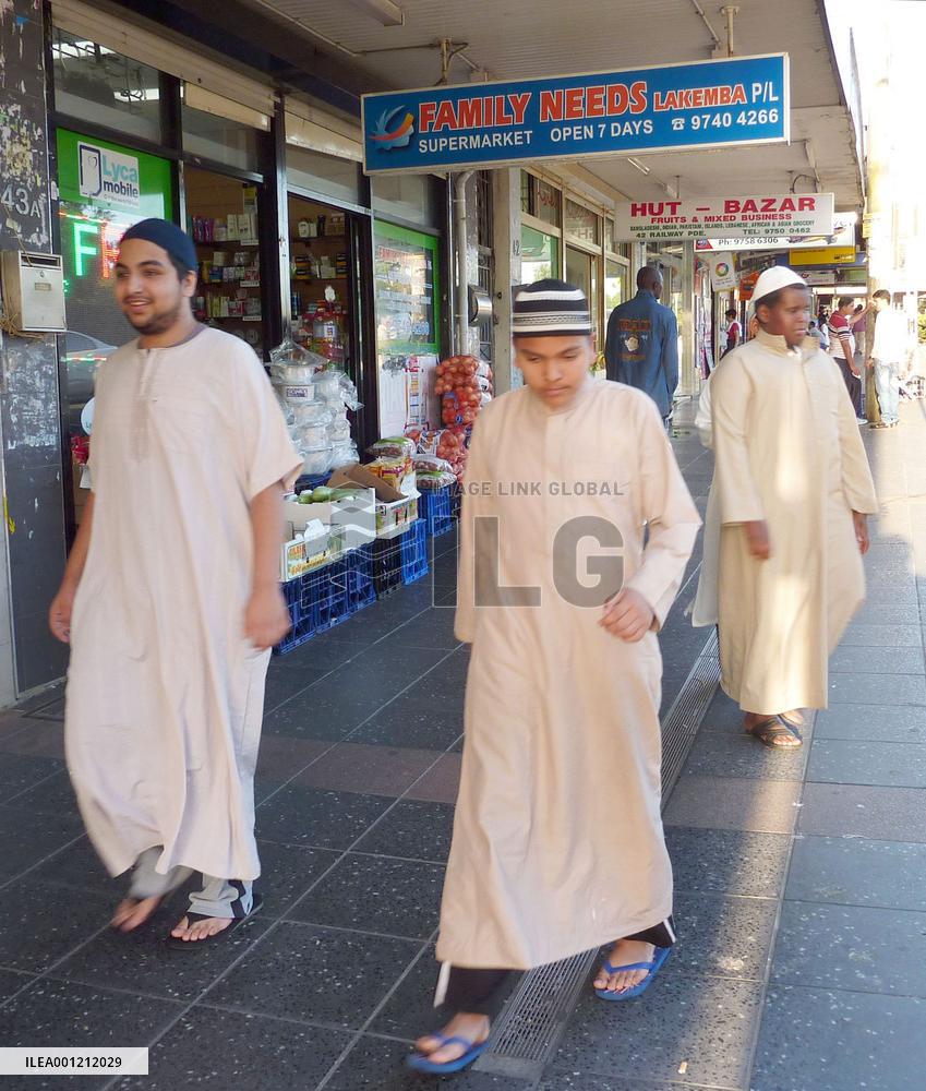 Muslims walk on Sydney street after shooting incident