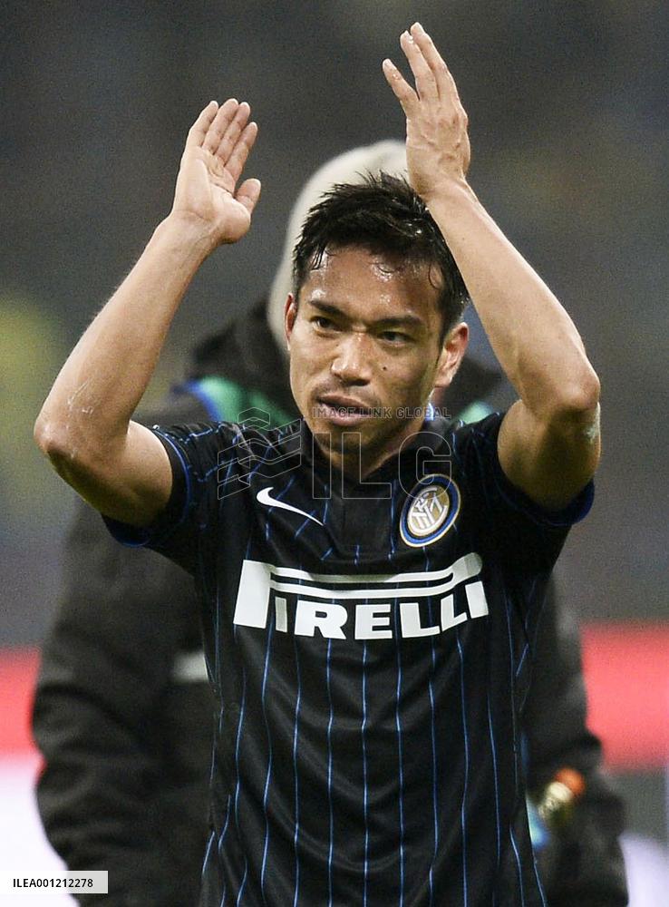 Inter Milan's Nagatomo reacts to cheers from supporters
