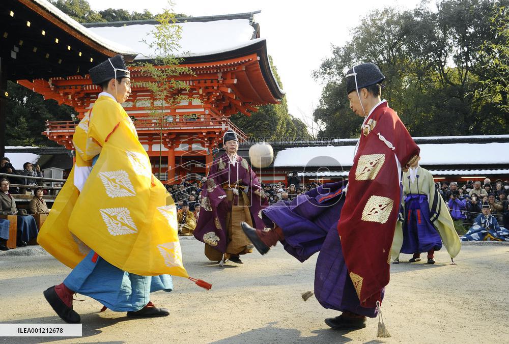People clad as ancient courtiers play football game