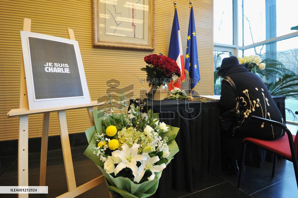 Visitor signs condolence note at French embassy in Beijing