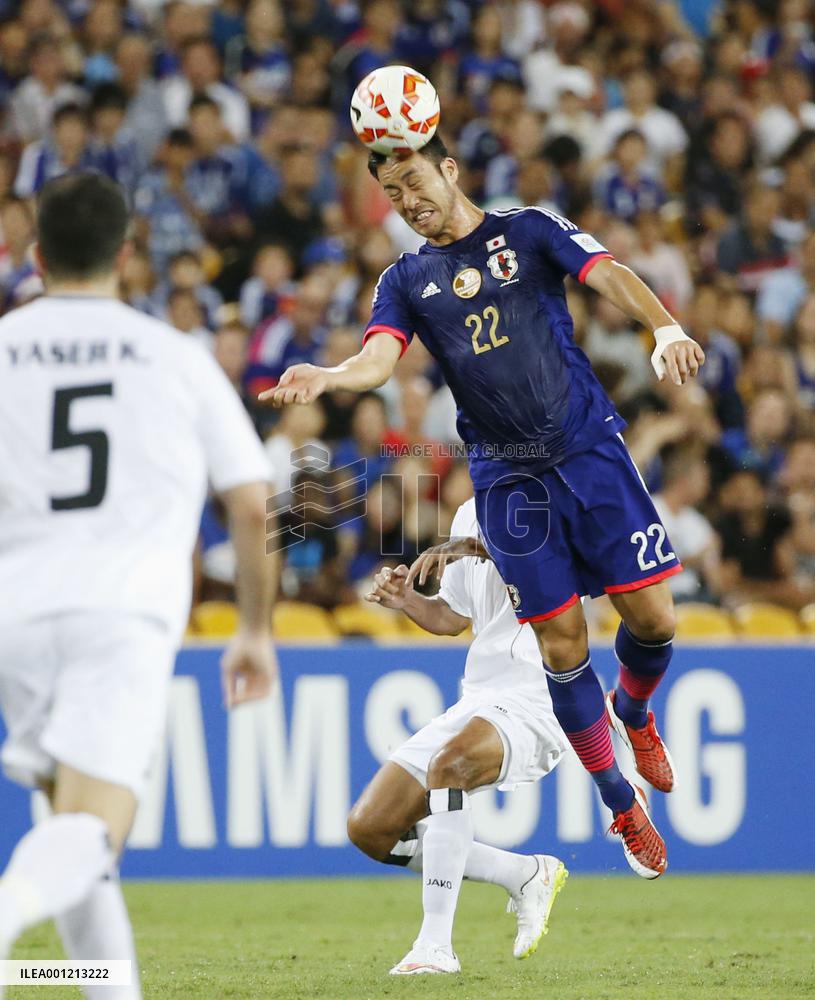 Japan defender Yoshida clears ball at Asian Cup