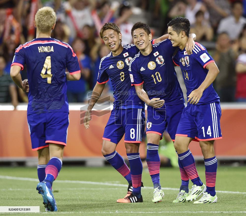 Japan reach quarterfinals in Asian Cup