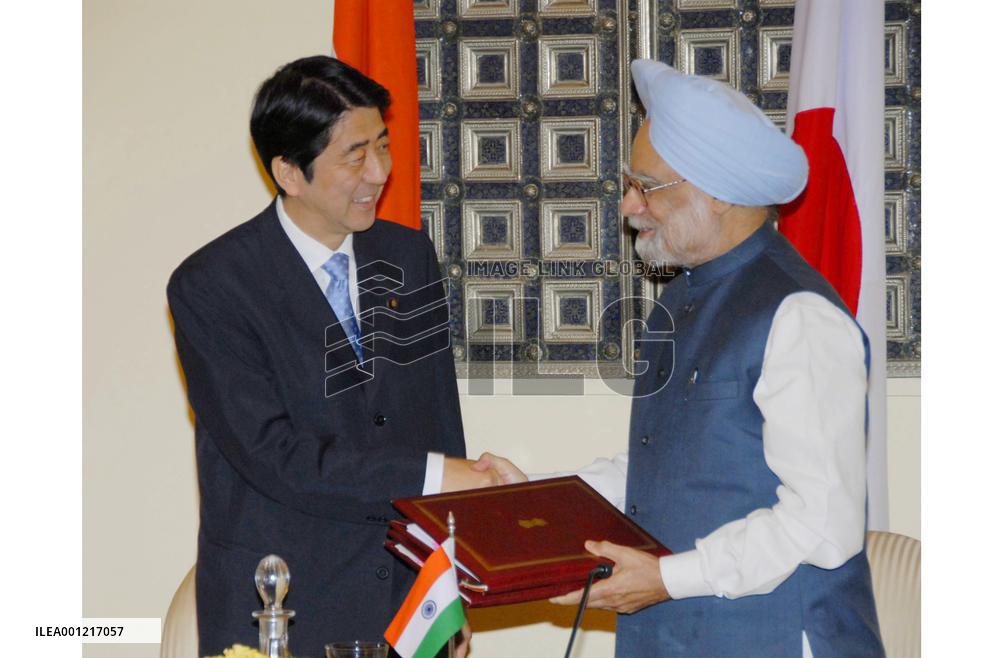 Abe, Singh adopt road map for ties, differ on climate, nukes