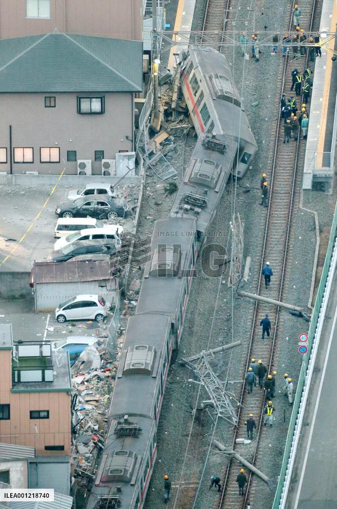 15 injured in collision between train, truck