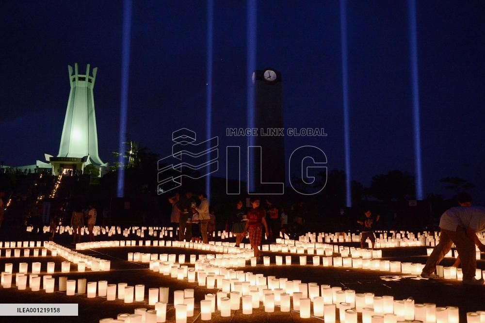 Candles lit in Okinawa to remember war dead