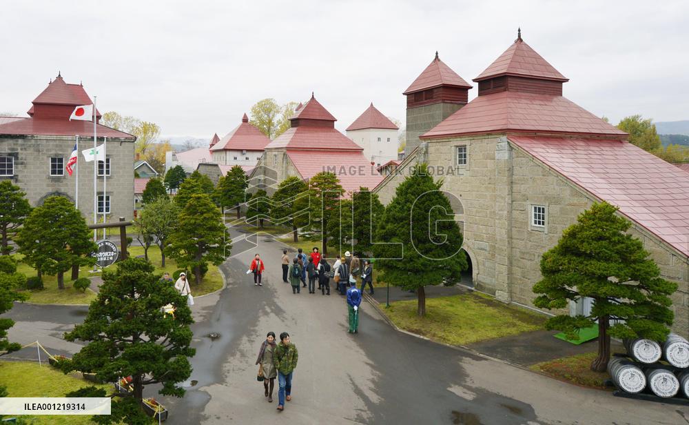 People visit whisky distillery, inspired by TV drama