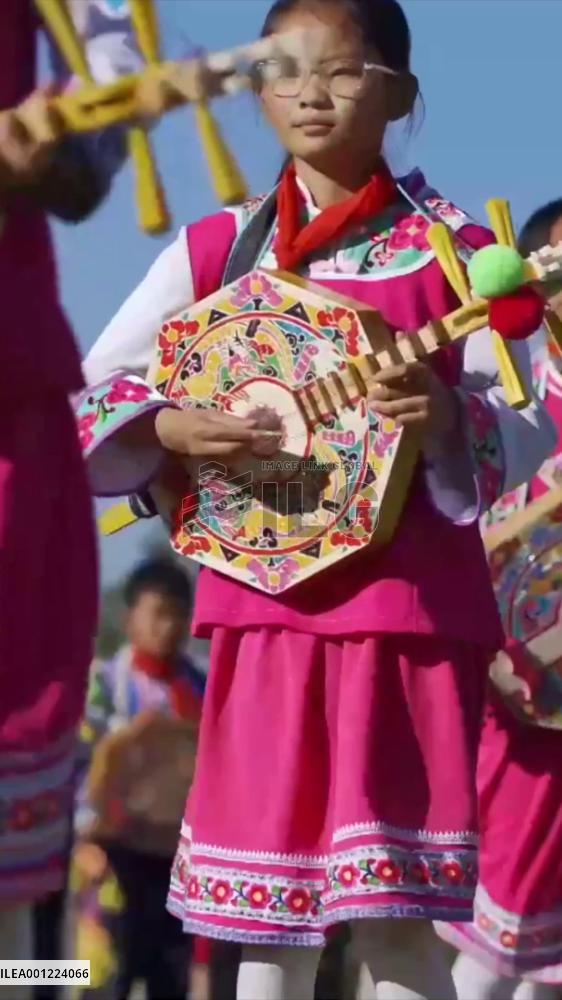 Students in China's Yunnan perform left foot dance during recess