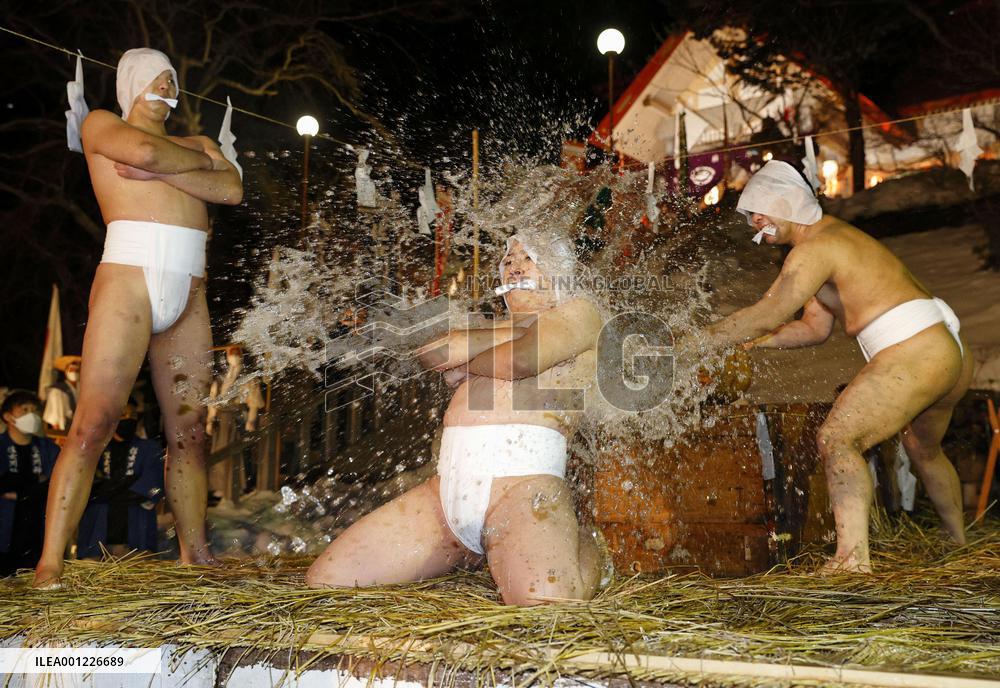 Water-splashing ritual in northern Japan