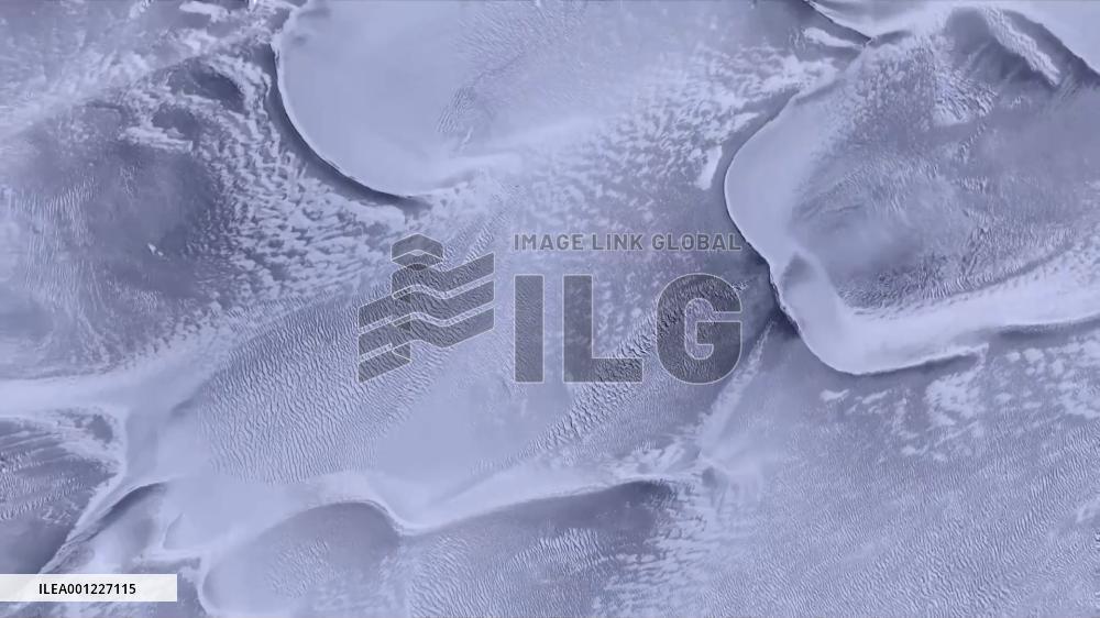 Breathtaking view of snow-covered Taklimakan Desert in NW China