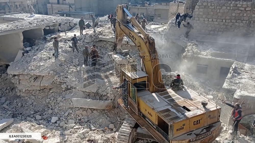 Building collapse in Syria's Aleppo kills 16