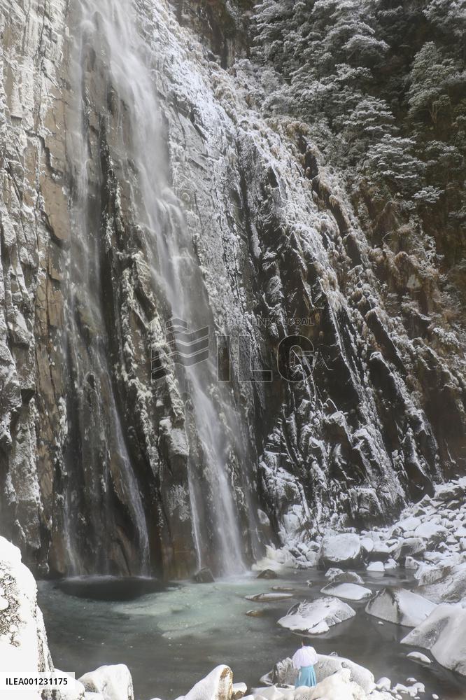 Frozen waterfall plunge pool in western Japan