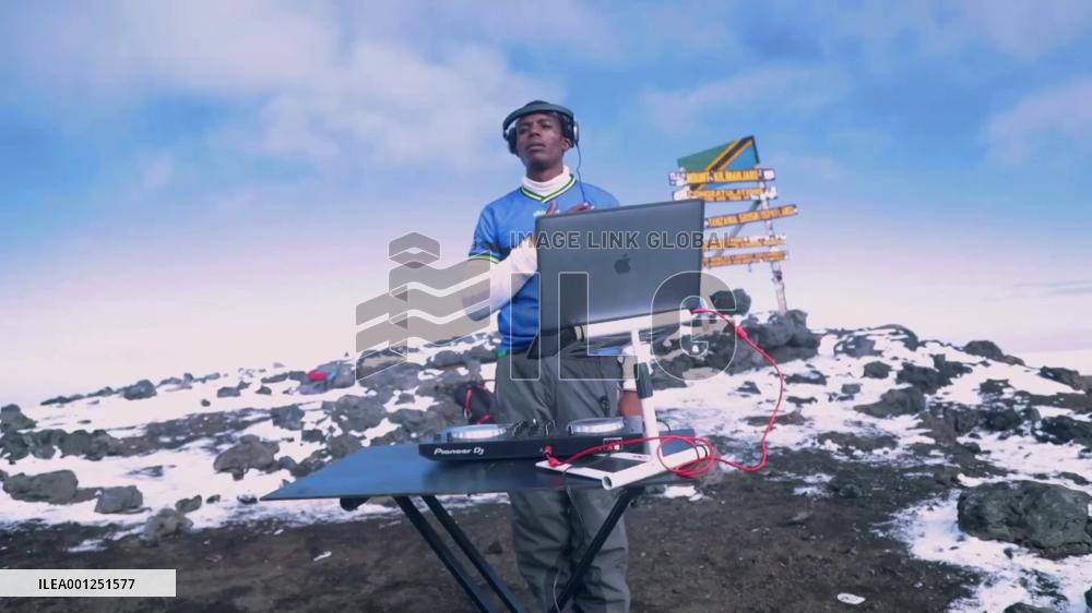 Tanzanian young DJ performs on top of Mount Kilimanjaro to promote tourism