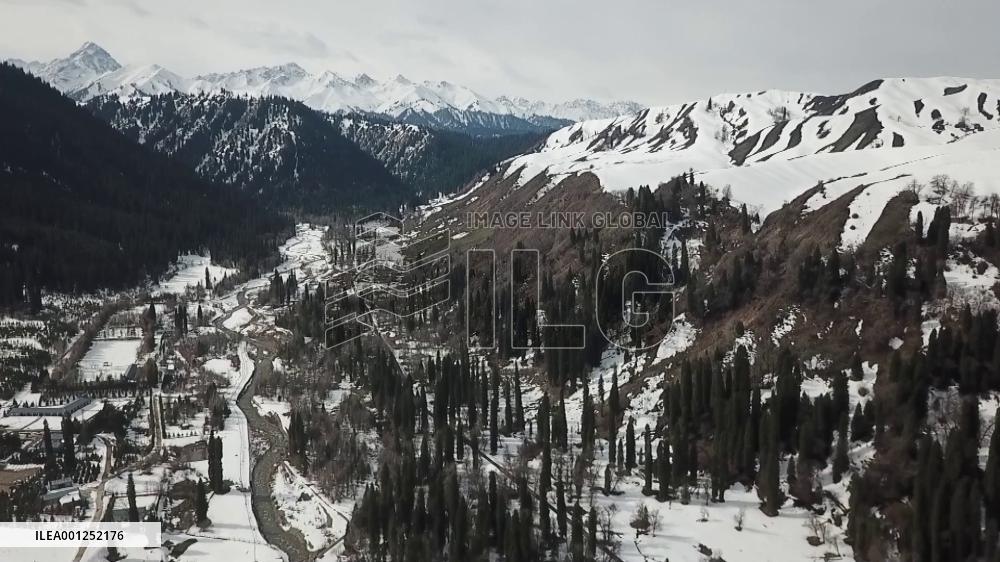 Firefighters patrol mountains in China's Xinjiang to prevent fire