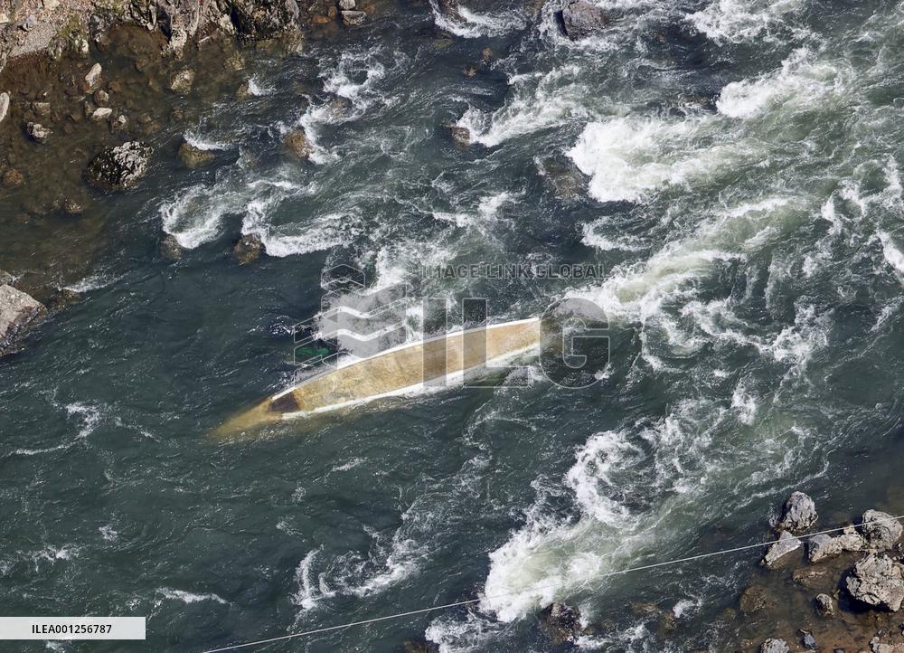 Kyoto tour boat with 30 aboard stranded