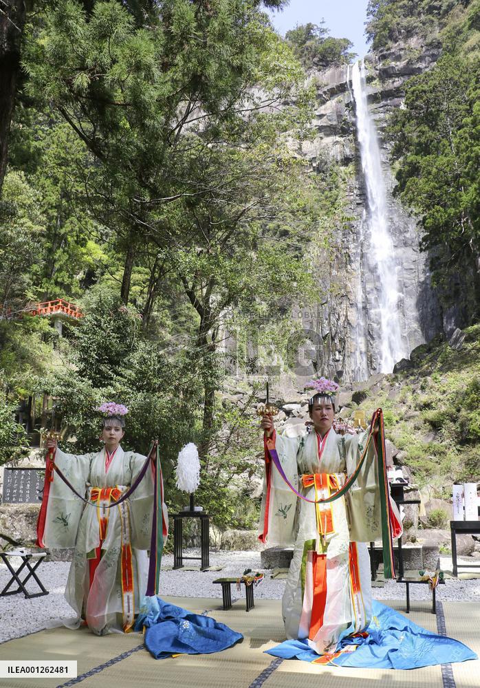Ritual at waterfall in western Japan