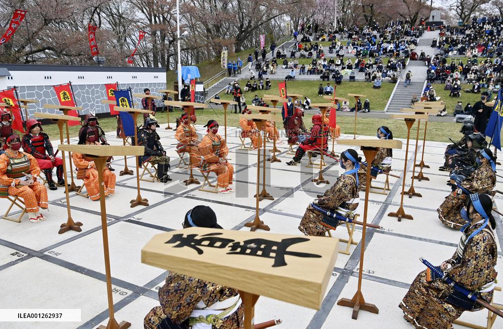 Shogi played with human pieces