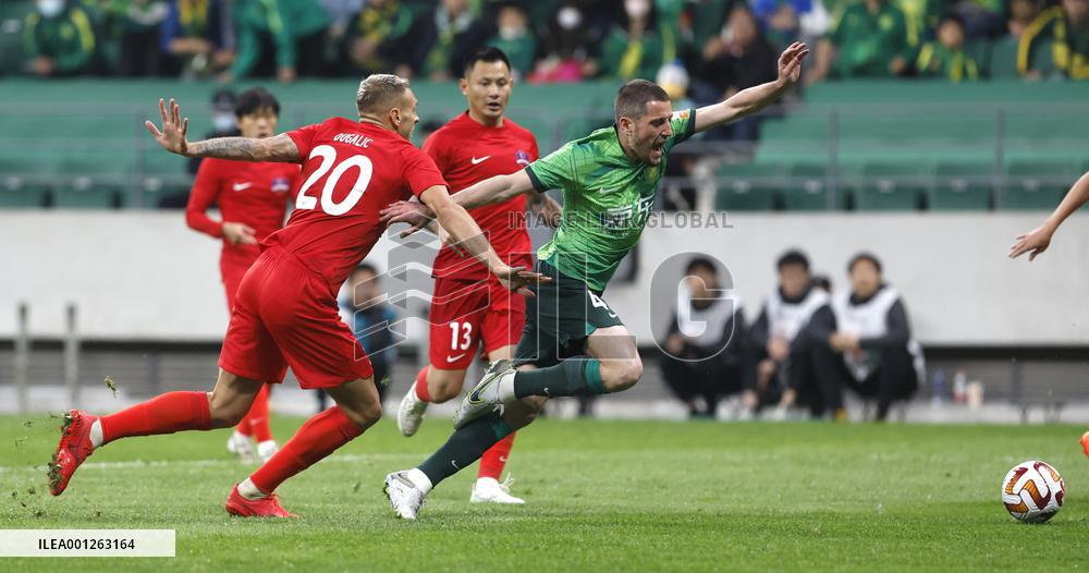 (SP)CHINA-BEIJING-FOOTBALL-CSL-BEIJING GUOAN VS MEIZHOU HAKKA (CN)
