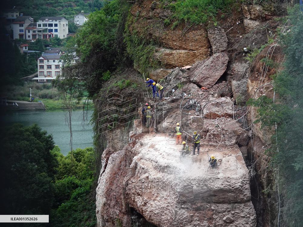 Workers Reinforced A Rock In Yichang