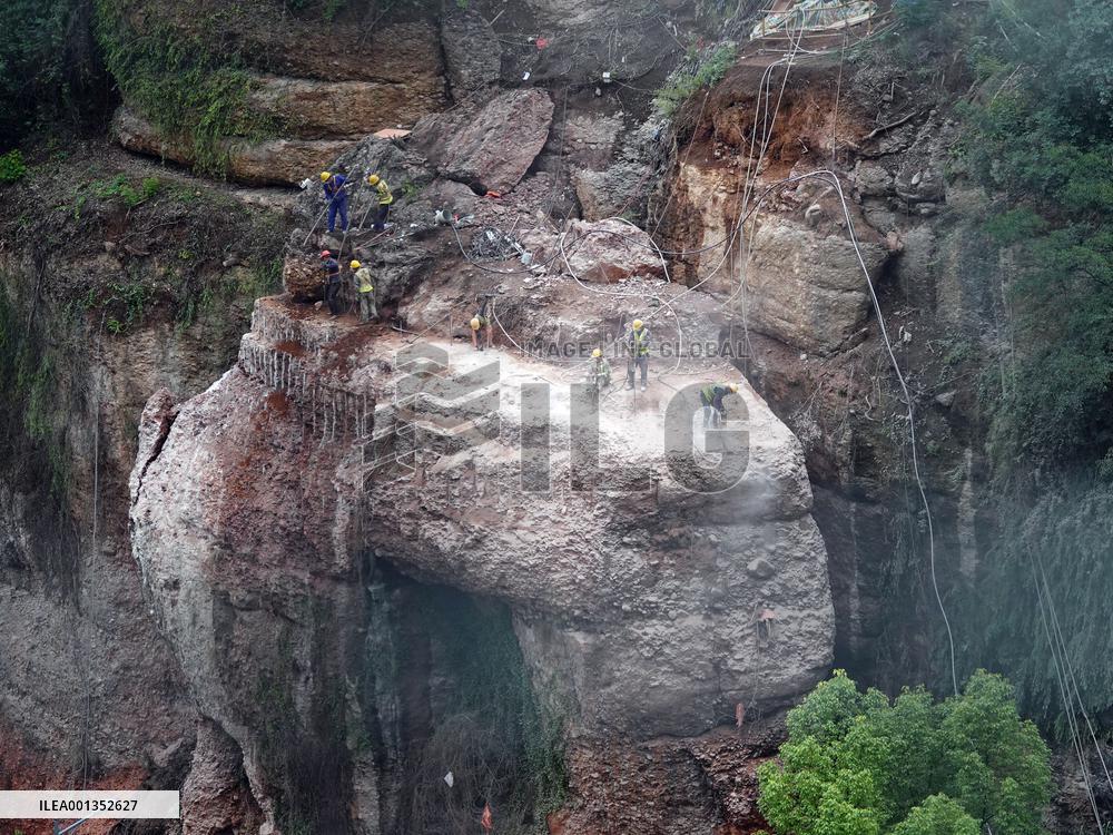 Workers Reinforced A Rock In Yichang