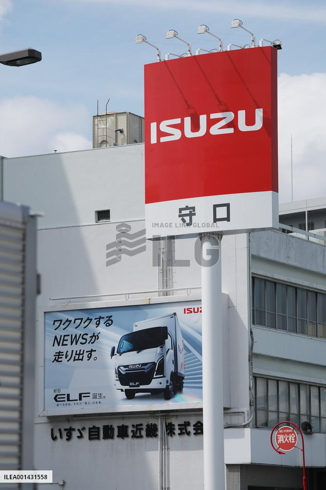 Logo and signage for Isuzu dealership.