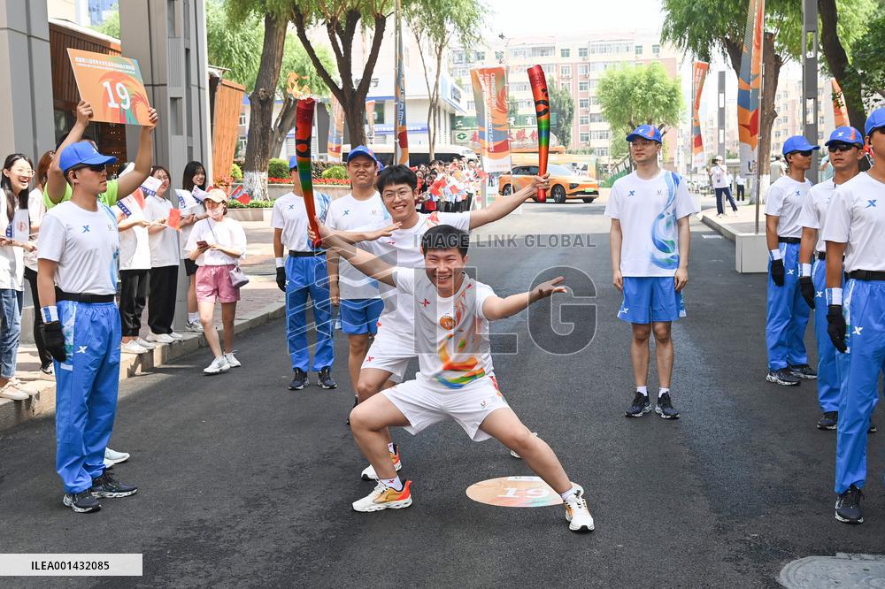 (SP)CHINA-HARBIN-WORLD UNIVERSITY GAMES-TORCH RELAY (CN)