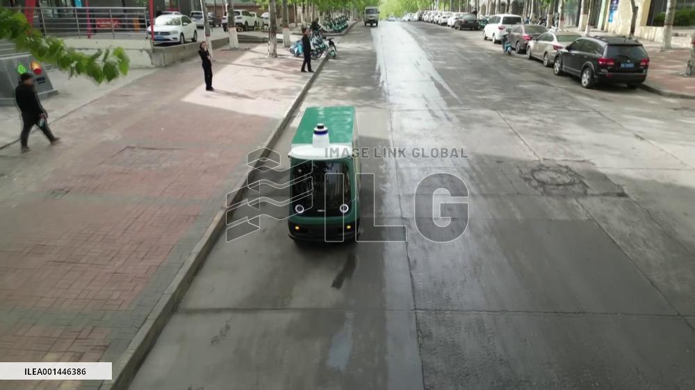 Unmanned delivery vehicles hit road in N China's Yangquan