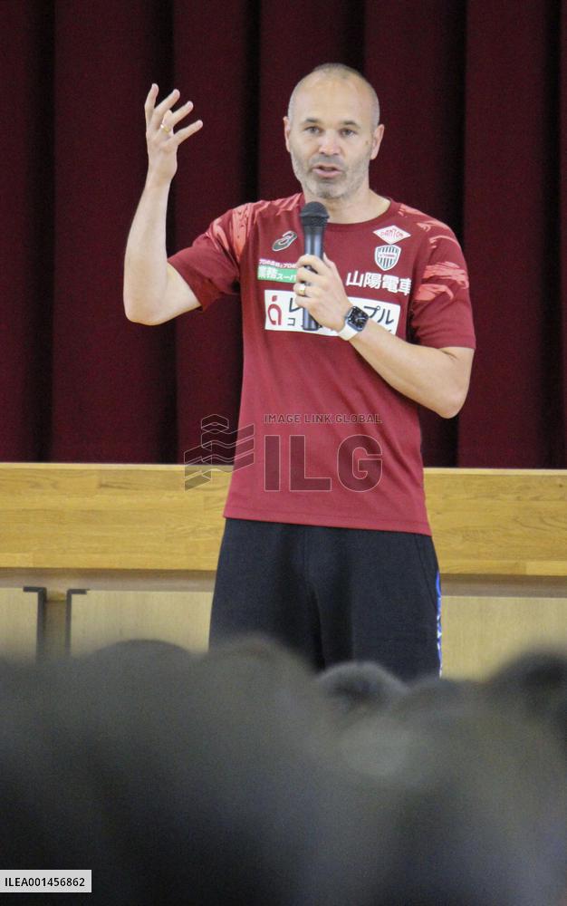 Ex-Spain football great Iniesta at Kobe elementary school