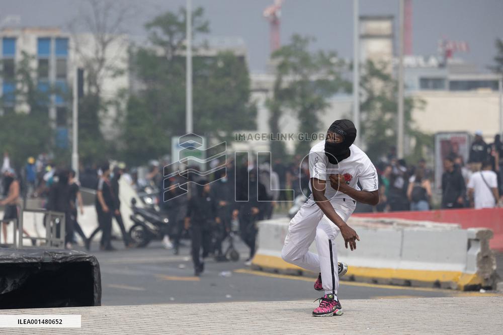 Protesters clash with police after the commemoration march for Nahel - Nanterre