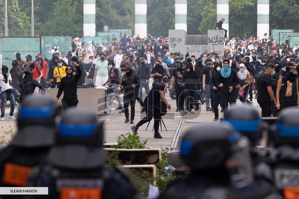 Protesters clash with police after the commemoration march for Nahel - Nanterre
