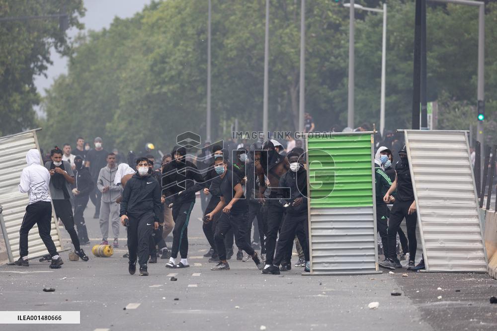 Protesters clash with police after the commemoration march for Nahel - Nanterre