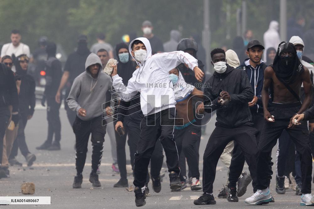 Protesters clash with police after the commemoration march for Nahel - Nanterre